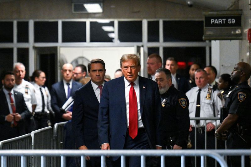 &copy; Reuters. FILE PHOTO: Former U.S. President Donald Trump walks toward the press to speak as he arrives for the first day of his trial for allegedly covering up hush money payments linked to extramarital affairs, at Manhattan Criminal Court in New York City on April