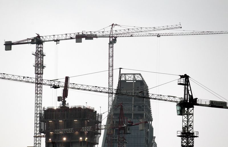 &copy; Reuters. New buildings under construction are seen in Milan April 18, 2012. REUTERS/ Stefano Rellandini/ File photo