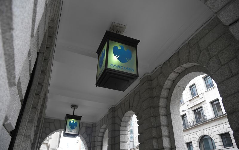 © Reuters. FILE PHOTO: The logo of Barclays bank is seen on glass lamps outside of a branch of the bank in the City of London financial district in London September 4, 2017. REUTERS/Toby Melville/File Photo