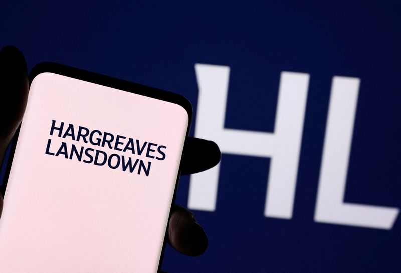 &copy; Reuters. FILE PHOTO: Hargreaves Lansdown logo is seen on a smartphone in front of displayed same logo in this illustration taken, December 1, 2021. REUTERS/Dado Ruvic/Illustration/File Photo
