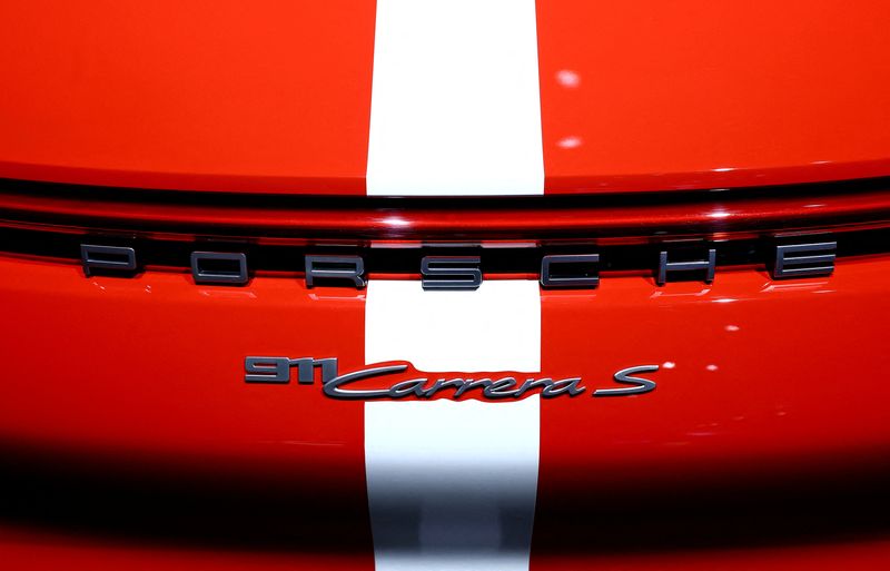 &copy; Reuters. FILE PHOTO: A logo on a Porsche 911 Carrera S is on display during the 75 years Porsche sports car exhibition "Driven by Dreams" in Berlin, Germany, January 25, 2023. REUTERS/ Lisi Niesner/File Photo