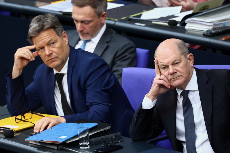 &copy; Reuters. German Chancellor Olaf Scholz, German Finance Minister Christian Lindner and German Economy, and Climate Minister Robert Habeck attend a session of the lower house of parliament, Bundestag, in the Reichstag Building, in Berlin, Germany, March 20, 2024. RE