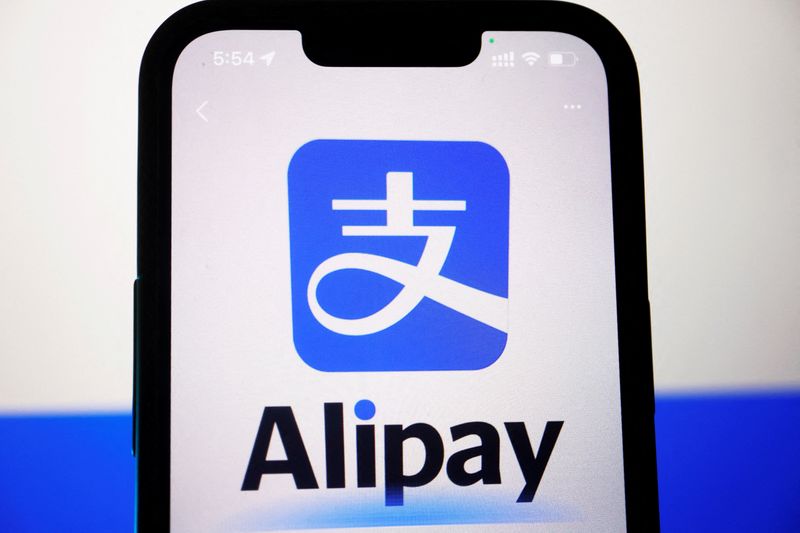 &copy; Reuters. FILE PHOTO: The logo of Alipay is seen through the camera of the app on a mobile phone, in this illustration picture taken June 28, 2023. REUTERS/Florence Lo/Illustration/File Photo