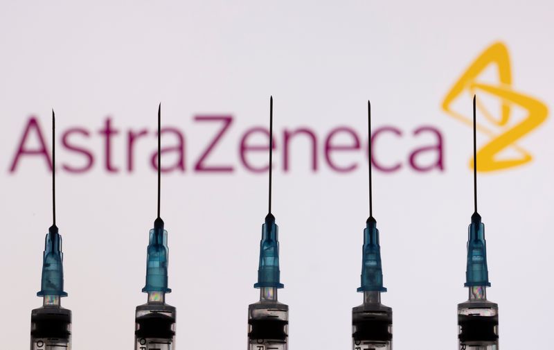 &copy; Reuters. FILE PHOTO: Syringes with needles are seen in front of a displayed AstraZeneca logo in this illustration taken, November 27, 2021. REUTERS/Dado Ruvic/Illustration/File Photo