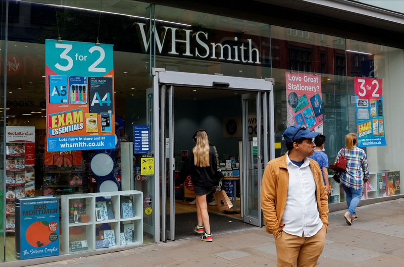 &copy; Reuters. A man stands in front of a WH Smith store in Manchester, Britain, May 26, 2023. REUTERS/Jason Cairnduff/ File Photo