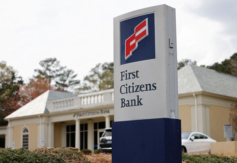 &copy; Reuters. The First Citizens Bank logo adorns a sign at a branch of the regional bank, which is headquartered in North Carolina, in Chapel Hill, North Carolina, U.S., March 28, 2023.   REUTERS/Jonathan Drake/File Photo