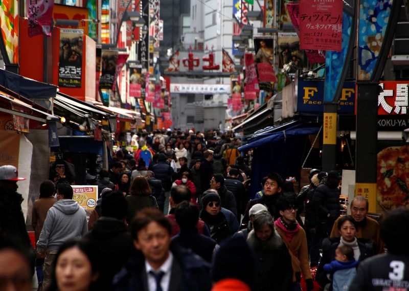 &copy; Reuters. People are seen at a market street in Tokyo, Japan, January 23, 2017. Picture taken on January 23, 2017. REUTERS/Kim Kyung-Hoon/File Photo