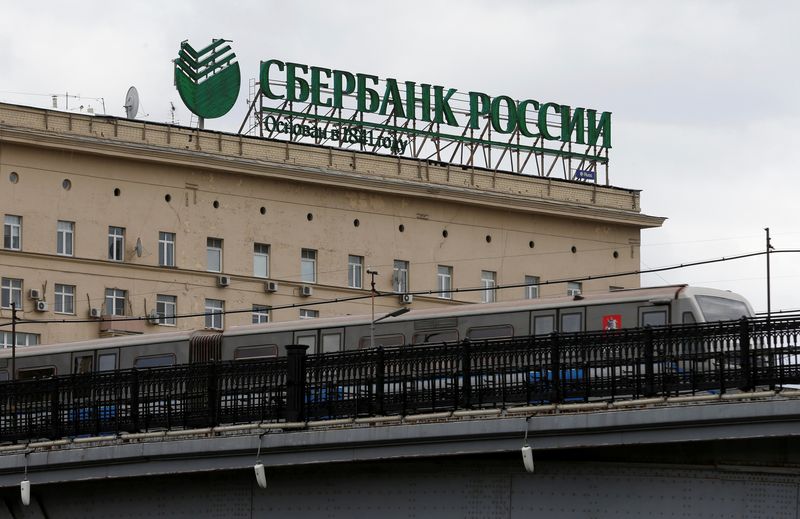 &copy; Reuters. A metro train moves on a bridge, with the logo of Sberbank on top of a building seen in the background, in central Moscow, Russia, April 22, 2016. REUTERS/Maxim Zmeyev/File Photo