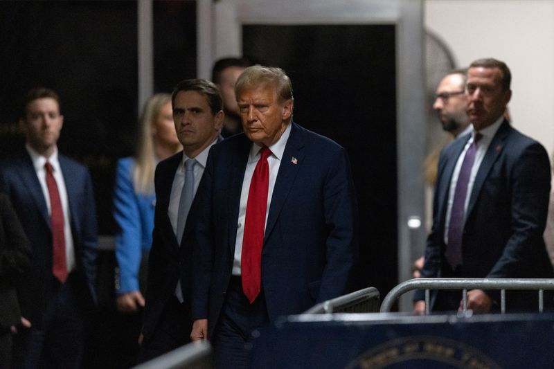 &copy; Reuters. FILE PHOTO: Former US President Donald Trump exits at Manhattan criminal court in New York, US, on Thursday, April 25, 2024.  JEENAH MOON/Pool via REUTERS/File Photo