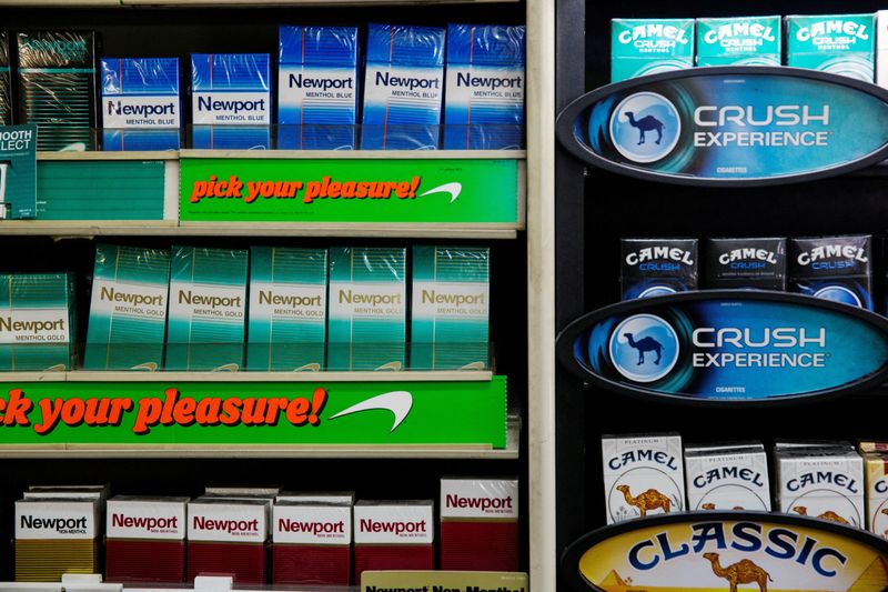 &copy; Reuters. FILE PHOTO: Newport and Camel cigarettes are stacked on a shelf inside a tobacco store in New York July 11, 2014. REUTERS/Lucas Jackson/File Photo