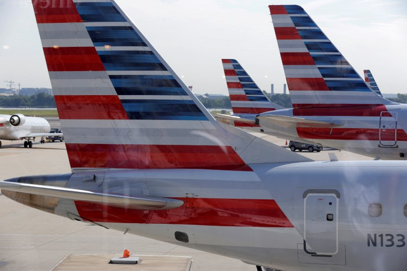 &copy; Reuters. FILE PHOTO: American Airlines aircraft are parked at Ronald Reagan Washington National Airport in Washington, U.S., August 8, 2016.      REUTERS/Joshua Roberts/File Photo