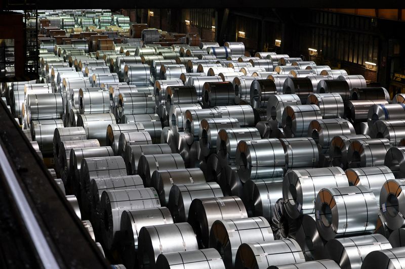 © Reuters. FILE PHOTO: Steel coils are waiting for delivery at the storage and distribution facility of German steel maker ThyssenKrupp in Duisburg, Germany, November 16, 2023.     REUTERS/Wolfgang Rattay/File Photo