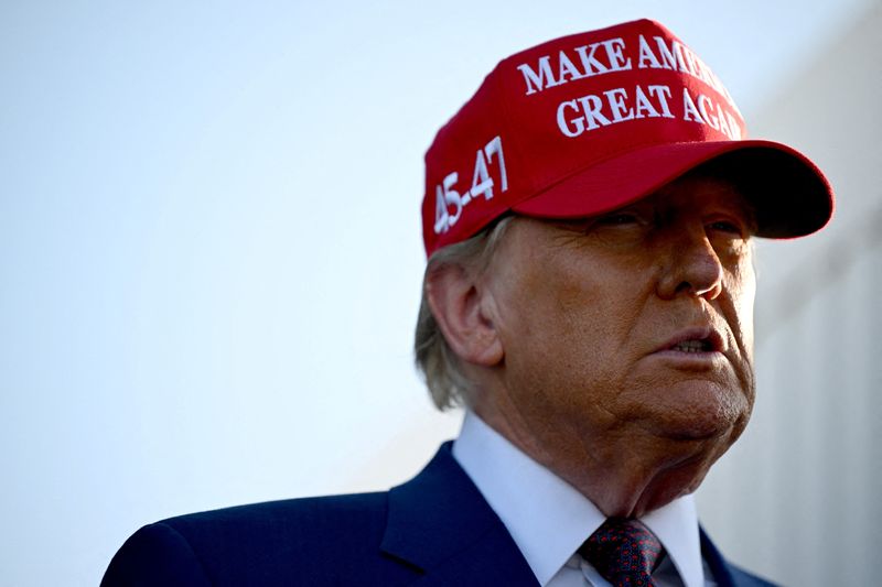 &copy; Reuters. FILE PHOTO: U.S. President-elect Donald Trump attends a viewing of the launch of the sixth test flight of the SpaceX Starship rocket, in Brownsville, Texas, U.S., November 19, 2024 . Brandon Bell/Pool via REUTERS/File Photo