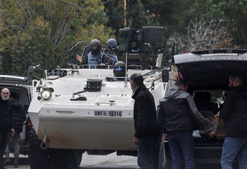 © Reuters. UN peacekeeper (UNIFIL) vehicle drives in Bent Jbeil, after a ceasefire between Israel and Hezbollah took effect, southern Lebanon, November 27, 2024. REUTERS/Aziz Taher