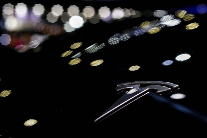 &copy; Reuters. Tesla logo is placed on the vehicle at the 41st Thailand International Motor Expo, in Bangkok, Thailand, November 29, 2024. REUTERS/Athit Perawongmetha/File Photo