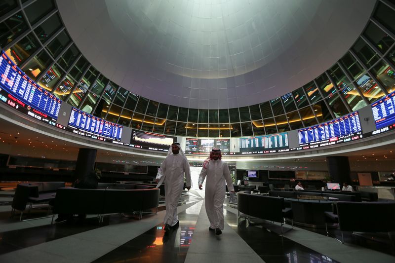 &copy; Reuters. FILE PHOTO: Traders walk out of Bahrain Bourse in Manama, Bahrain, September 16, 2019. REUTERS/ Hamad I Mohammed/File Photo