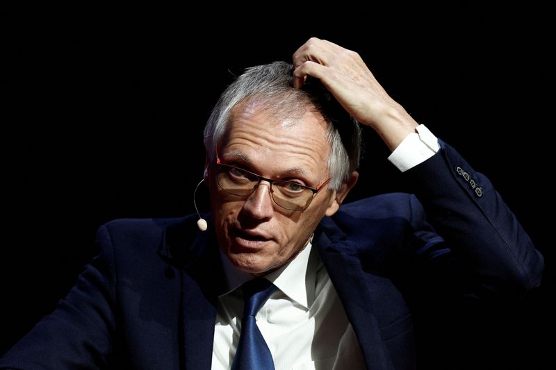 © Reuters. FILE PHOTO: Carlos Tavares, Chief Executive Officer of Stellantis, gestures as he speaks at the Paris Automotive Summit during the 2024 Paris Auto Show in Paris, France, October 15, 2024. REUTERS/Benoit Tessier/File Photo