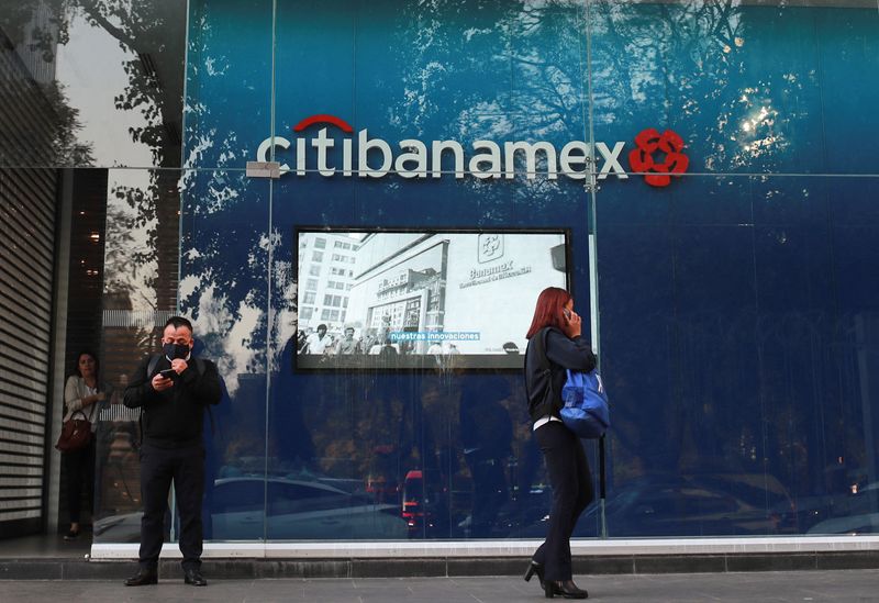 &copy; Reuters. FILE PHOTO: People stand outside a Citibanamex bank branch in Mexico City, Mexico January 30, 2023. REUTERS/Henry Romero/File photo