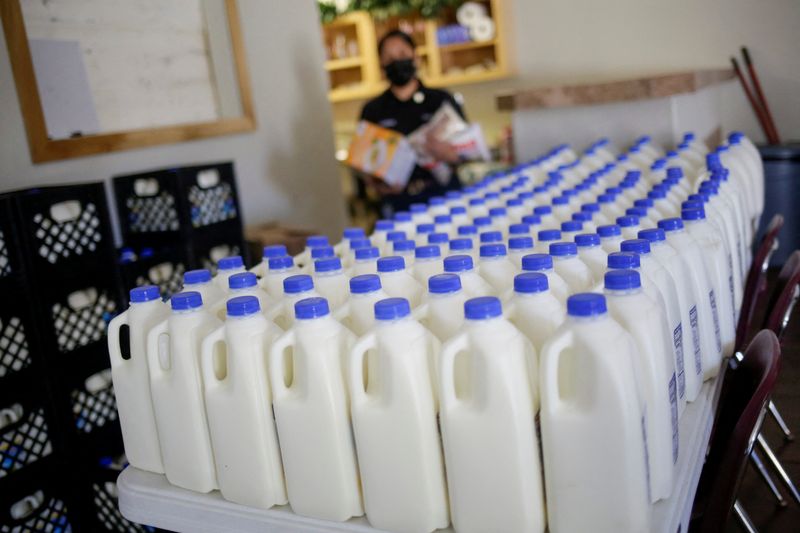 © Reuters. FILE PHOTO: Plastic containers with milk are seen inside the El Elyon church in El Paso, Texas, U.S. March 17, 2021. REUTERS/Jose Luis Gonzalez/File Photo