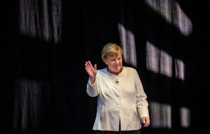 &copy; Reuters. FILE PHOTO: Former German Chancellor Angela Merkel presents her memoirs, titled 'Freedom. Memories 1954 - 2021' (Freiheit. Erinnerungen 1954 – 2021) in Berlin, Germany, November 26, 2024.   Michael Kappeler/Pool via REUTERS/File Photo