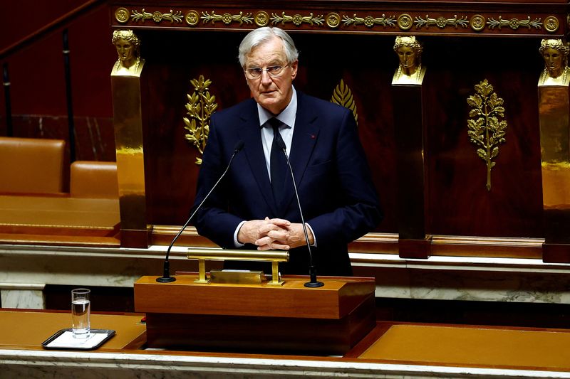 &copy; Reuters. French Prime Minister Michel Barnier speaks to announce the use by the French government of article 49.3, a special clause in the French Constitution, to push the budget bill through the National Assembly without a vote by lawmakers, during a debate on th