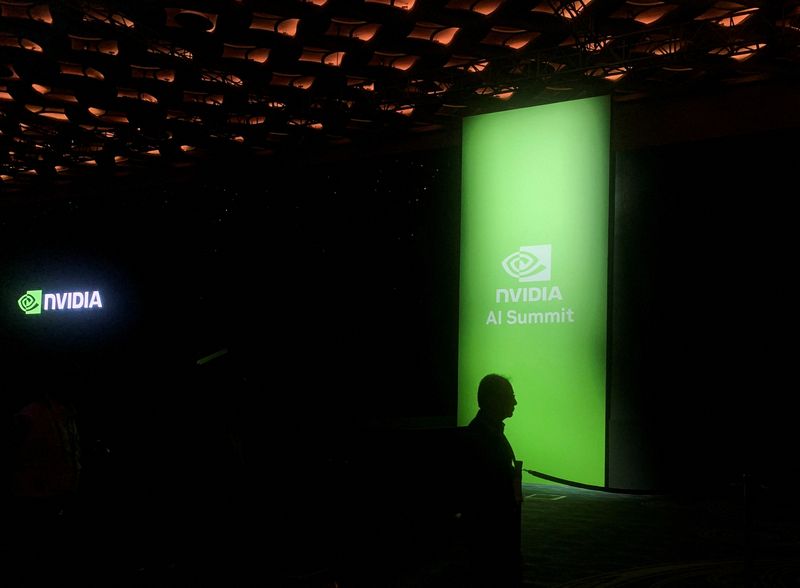 &copy; Reuters. FILE PHOTO: A man walks past the Nvidia logo at the company's AI Summit in Mumbai, India, October 24, 2024. REUTERS/Arsheeya Bajwa/File Photo