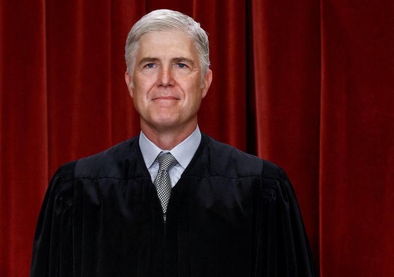 &copy; Reuters. FILE PHOTO: U.S. Supreme Court Associate Justice Neil M. Gorsuch poses during a group portrait at the Supreme Court in Washington, U.S., October 7, 2022. REUTERS/Evelyn Hockstein/File Photo