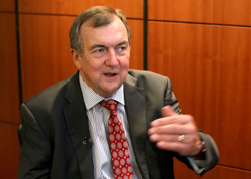 © Reuters. FILE PHOTO: Mark Bristow, chief executive officer of Barrick Gold, speaks during an interview at the Investing in African Mining Indaba conference in Cape Town, South Africa February 5, 2019.  REUTERS/Mike Hutchings/File Photo