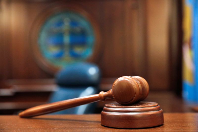 &copy; Reuters. FILE PHOTO: A gavel and a block is pictured on the judge's bench in this illustration picture taken in the Sussex County Court of Chancery in Georgetown, Delaware, U.S., June 9, 2021. REUTERS/Andrew Kelly/File Photo