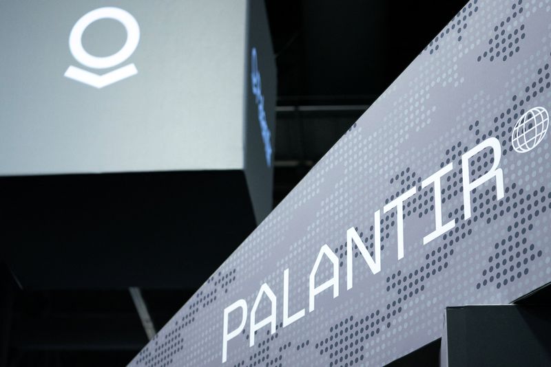 &copy; Reuters. FILE PHOTO: Signage for Palantir is seen during the Association of the United States Army annual meeting and exposition at the Walter E. Washington Convention Center in Washington, U.S., October 14, 2024. REUTERS/Nathan Howard/File Photo