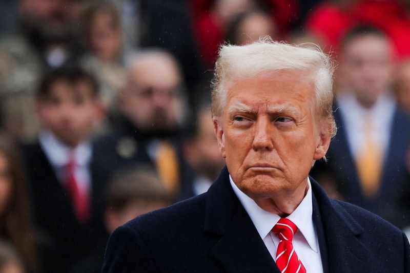 &copy; Reuters. FILE PHOTO: U.S. President-elect Donald Trump attends a wreath laying ceremony at Arlington National Cemetery ahead of the presidential inauguration in Arlington, Virginia, U.S. January 19, 2025.  REUTERS/Carlos Barria/File Photo