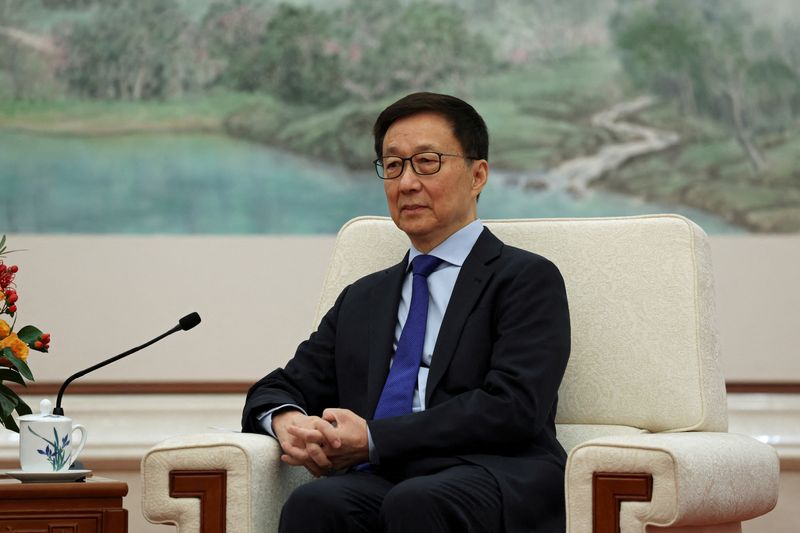 © Reuters. FILE PHOTO: Chinese Vice President Han Zheng attends a meeting with Britain's Chancellor of the Exchequer Rachel Reeves (not pictured) at the Great Hall of the People in Beijing, China January 11, 2025. REUTERS/Florence Lo/Pool/File Photo