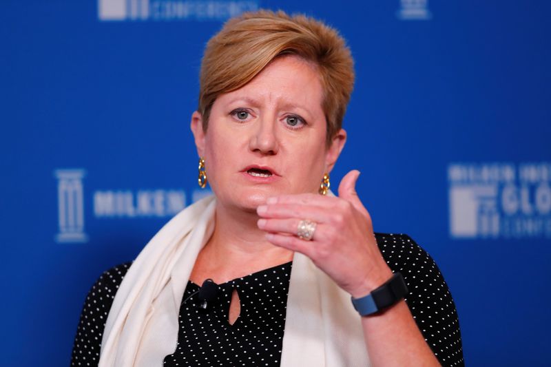 © Reuters. FILE PHOTO: Anne Walsh, Senior Managing Director, Chief Investment Officer, Fixed Income, Guggenheim Partners, speaks at the Milken Institute 21st Global Conference in Beverly Hills, California, U.S., April 30, 2018. REUTERS/Mike Blake/File Photo