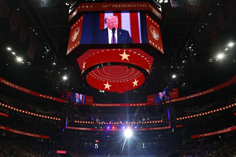 &copy; Reuters. U.S. President Donald Trump is shown on the screen on the inauguration day of his second presidential term, inside Capital One arena, in Washington, U.S. January 20, 2025. REUTERS/Amanda Perobelli