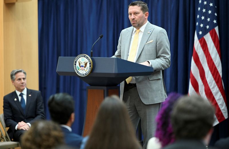 &copy; Reuters. FILE PHOTO: U.S. Secretary of State Antony Blinken looks on as AfghanEvac founder Shawn VanDiver speaks during a Memorandum of Understanding signing at the National Museum for American Diplomacy in the Department of State in Washington, U.S., June 12, 202