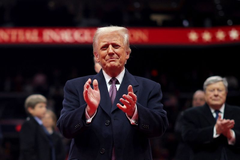 &copy; Reuters. U.S. President Donald Trump attends the inaugural parade inside Capital One Arena on the inauguration day of his second presidential term, in Washington, U.S. January 20, 2025. REUTERS/Carlos Barria