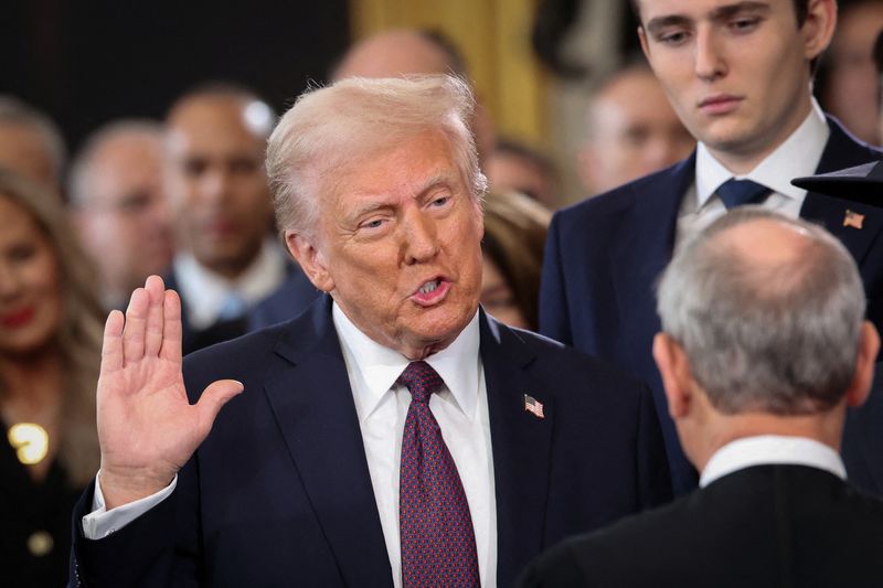 © Reuters. The U.S. President Donald Trump takes oath connected  the time  of his Presidential Inauguration astatine  the Rotunda of the U.S. Capitol successful  Washington, U.S., January 20, 2025. REUTERS/Kevin Lamarque/Pool 