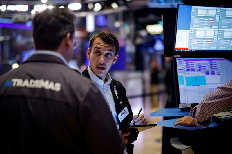  Traders enactment    connected  the level  astatine  the New York Stock Exchange (NYSE) successful  New York City, U.S., September 9, 2024.  REUTERS/Brendan McDermid/File Photo