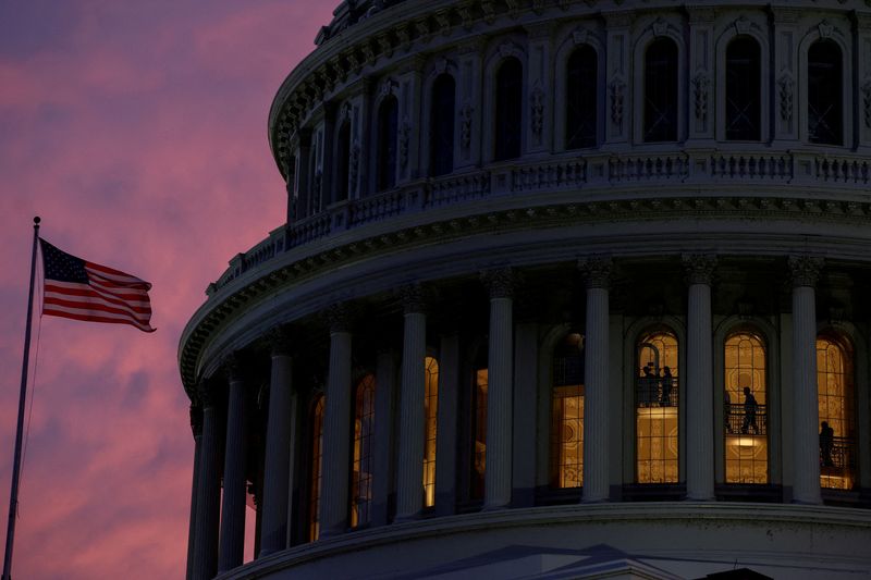 &copy; Reuters. FILE PHOTO: People walk inside the upper floors of the rotunda of the U.S. Capitol building at sunset in Washington, U.S., January 4, 2023 REUTERS/Evelyn Hockstein/File Photo