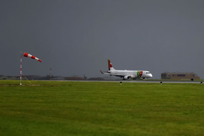 &copy; Reuters. FILE PHOTO: A TAP Air Portugal plane is seen at Lisbon's airport, Portugal, December 11, 2020. REUTERS/Pedro Nunes/File Photo