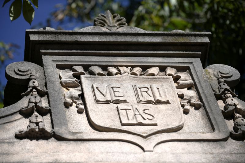 © Reuters. FILE PHOTO: A stone carving of Harvard's motto 