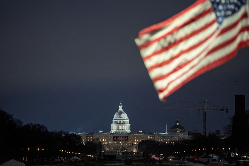  The U.S. emblem  flutters successful  beforehand   of the U.S. Capitol gathering  successful  Washington, U.S., January 16, 2025. REUTERS/Marko Djurica/File Photo