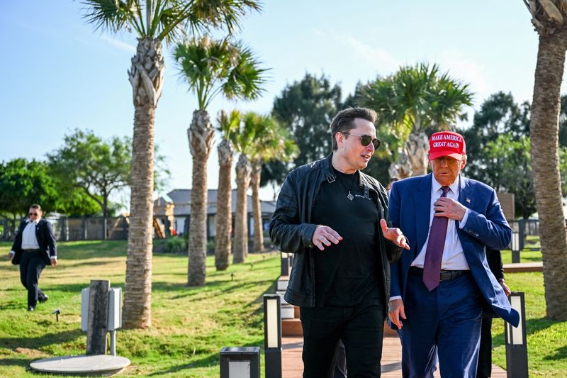  Elon Musk greets U.S. President-elect Donald Trump arsenic  helium  arrives to be  a viewing of the motorboat  of the sixth trial  formation  of the SpaceX Starship rocket successful  Brownsville, Texas, U.S., November 19, 2024. Brandon Bell/Pool via REUTERS/File Photo