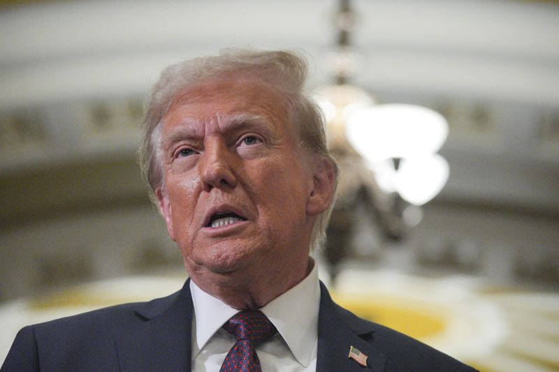  U.S. President-elect Donald Trump speaks after a meeting with Republicans in Congress at the U.S. Capitol building in Washington, U.S. January 8, 2025. REUTERS/Jeenah Moon/File Photo