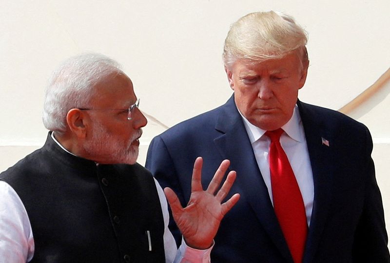 © Reuters. FILEPHOTO: U.S. President Donald Trump and Indian Prime Minister Narendra Modi talk as they arrive after a joint press conference at the Hyderabad House in New Delhi, India, February 25, 2020. REUTERS/Al Drago/File Photo