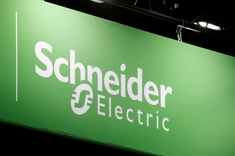  The logo of Schneider Electric is pictured at the Global Industrie exhibition in Villepinte near Paris, France, March 26, 2024. REUTERS/Benoit Tessier/File Photo