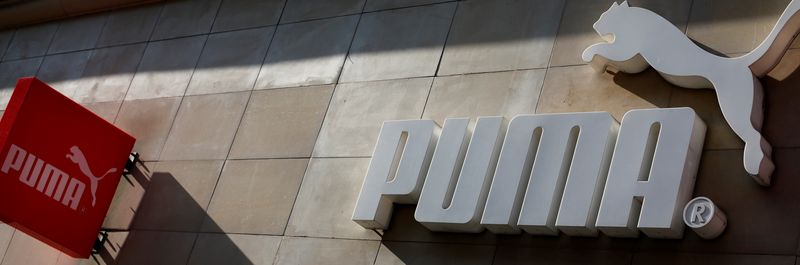 © Reuters. The logo of German sports goods firm Puma is seen at the entrance of one of its stores in Vienna, Austria, March 18, 2016.   REUTERS/Leonhard Foeger/File Photo