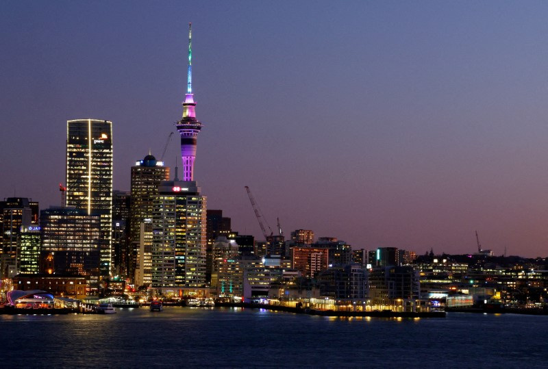 © Reuters. FILE PHOTO: The skyline of Auckland, New Zealand, seen at sunset. Auckland, New Zealand - August 3, 2023 REUTERS/Molly Darlington/File Photo