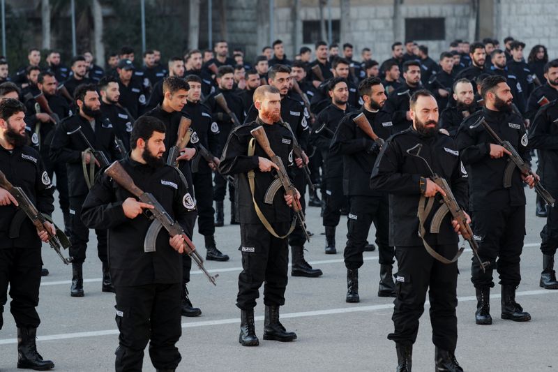 &copy; Reuters. FILE PHOTO: Syrian police members attend their graduation ceremony, after the ouster of Syria's Bashar al-Assad, at the Police Academy under the Syrian Salvation Government, in Damascus, Syria January 14, 2025. REUTERS/Khalil Ashawi/File Photo