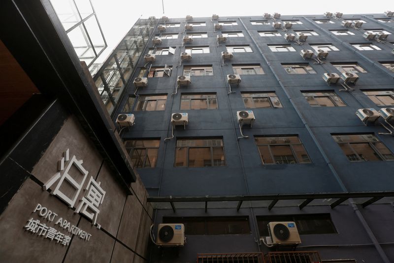 &copy; Reuters. FILE PHOTO: The exterior of a building inside an area with so-called youth apartments by Chinese developer China Vanke in Shenzhen, China April 26, 2017. REUTERS/Bobby Yip/File Photo